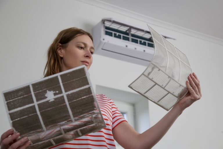 woman holding ductless air filters