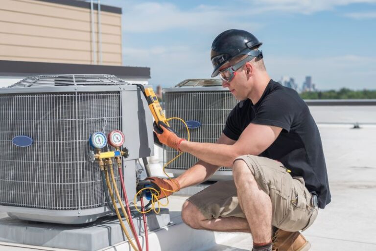 ac tech fixing unit on roof