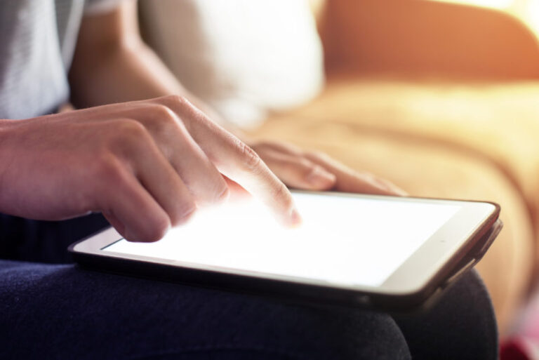 PRO woman using app ac shutterstock  e